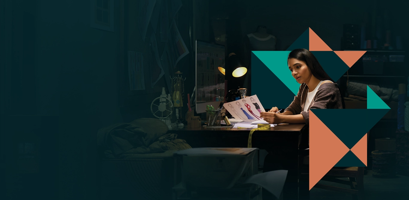 Fashion design workspace with designer