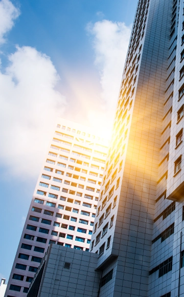 High-rise buildings under a blue sky