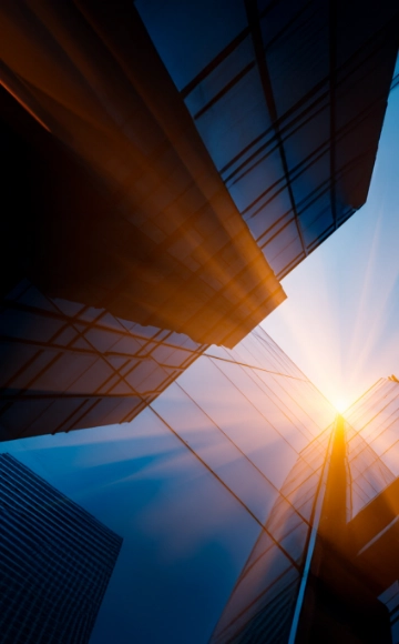 Upward view of tall glass buildings